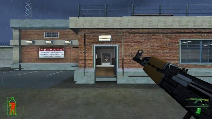 First-person view of an outdoor military compound with a rifle visible in the foreground